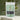 Green Tea in a refreshing package with loose green tea leaves showcased in the background.