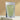 Close-up of organic moringa powder in green packaging